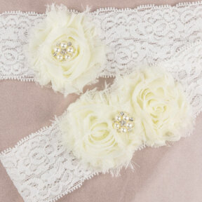 vintage lace bridal garter set with ivory flowers and pearl centres